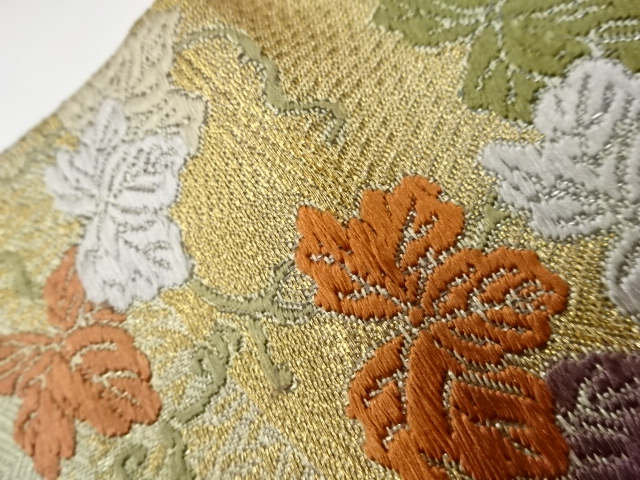  笹に蔓草・鶴・流水模様織出し袋帯